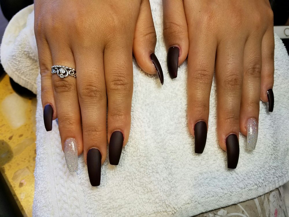 Long matte black set with two glitter accent nails.