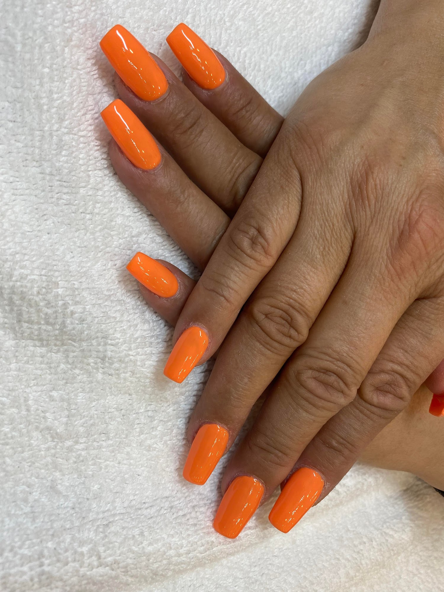 Glossy tangerine coffin-shaped set.