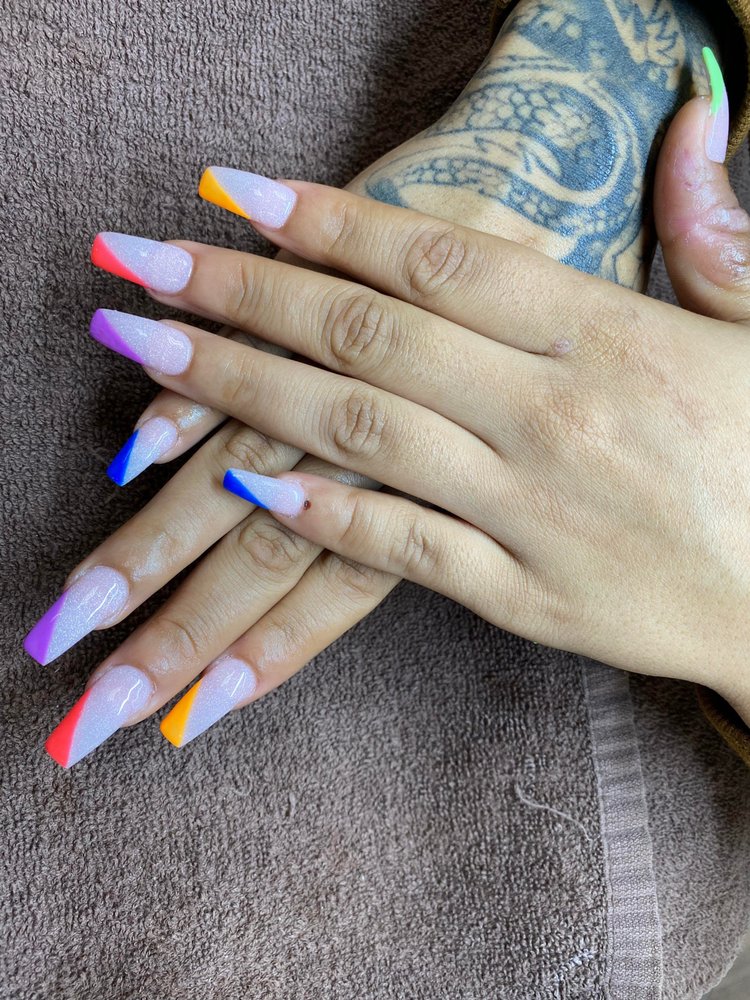 Long glitter set with rainbow French tips.